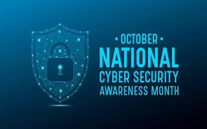 Digital shield icon with a glowing lock symbol representing online safety for October National Cybersecurity Awareness Month.