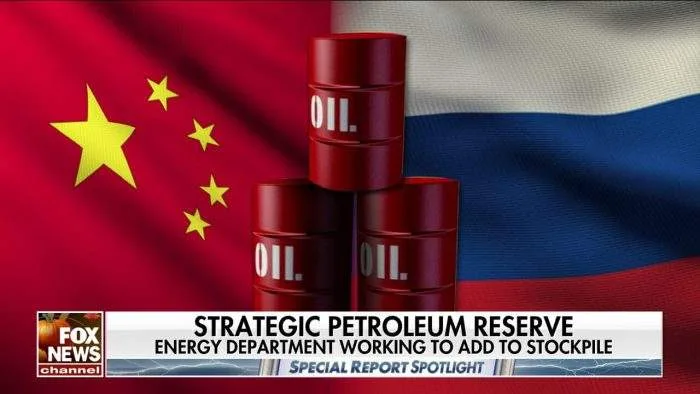 Oil barrels stacked between Chinese and Russian flags, representing China–Russia energy trade and global oil reserves.