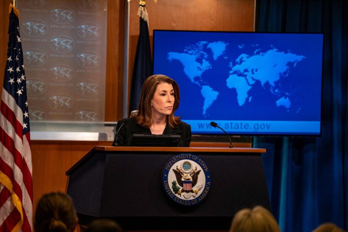 Former U.S. State Department spokesperson Tammy Bruce delivering a press briefing at the podium in Washington