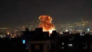 Overnight U.S.-Israeli airstrikes lighting up the Tehran skyline on April 4, 2026.