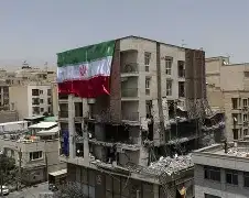 A television broadcast of President Trump issuing a warning to Iran about "total destruction" over its nuclear program.