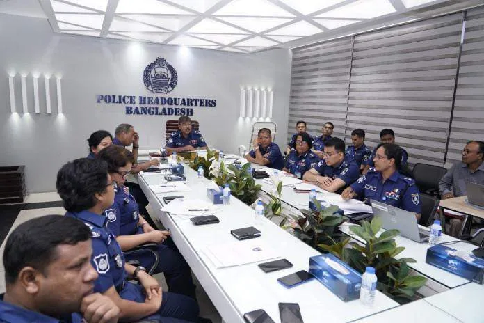 Horizontal view of police headquarters in Dhaka during a media briefing.