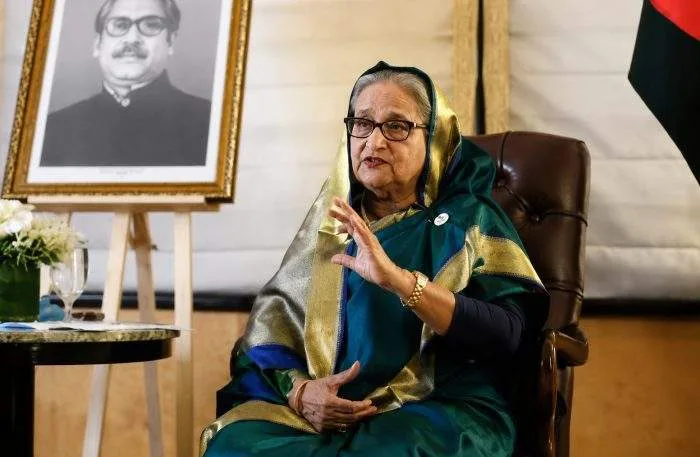 Horizontal close-up photo of Awami League President Sheikh Hasina during a media address.