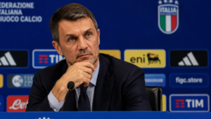Horizontal shot showing Paolo Maldini looking thoughtful during an official press conference.