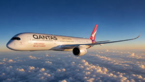 Horizontal shot showing the Airbus A350-1000ULR commercial aircraft in flight over the clouds.